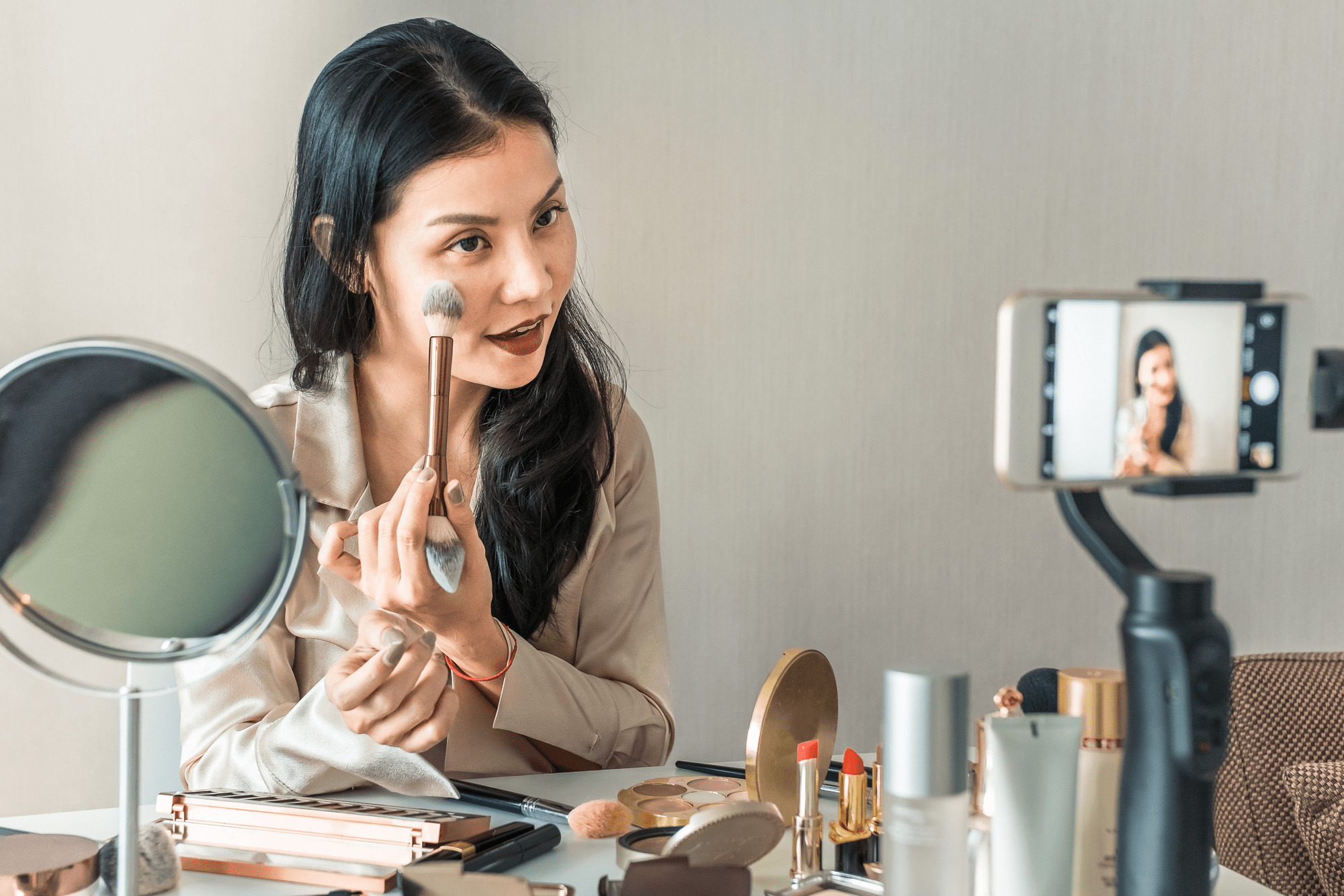 Beauty products arranged on a vanity
